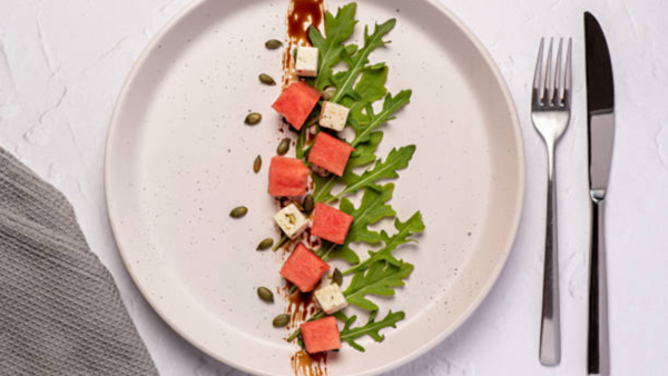 Elegant watermelon arugula balsamic glaze salad